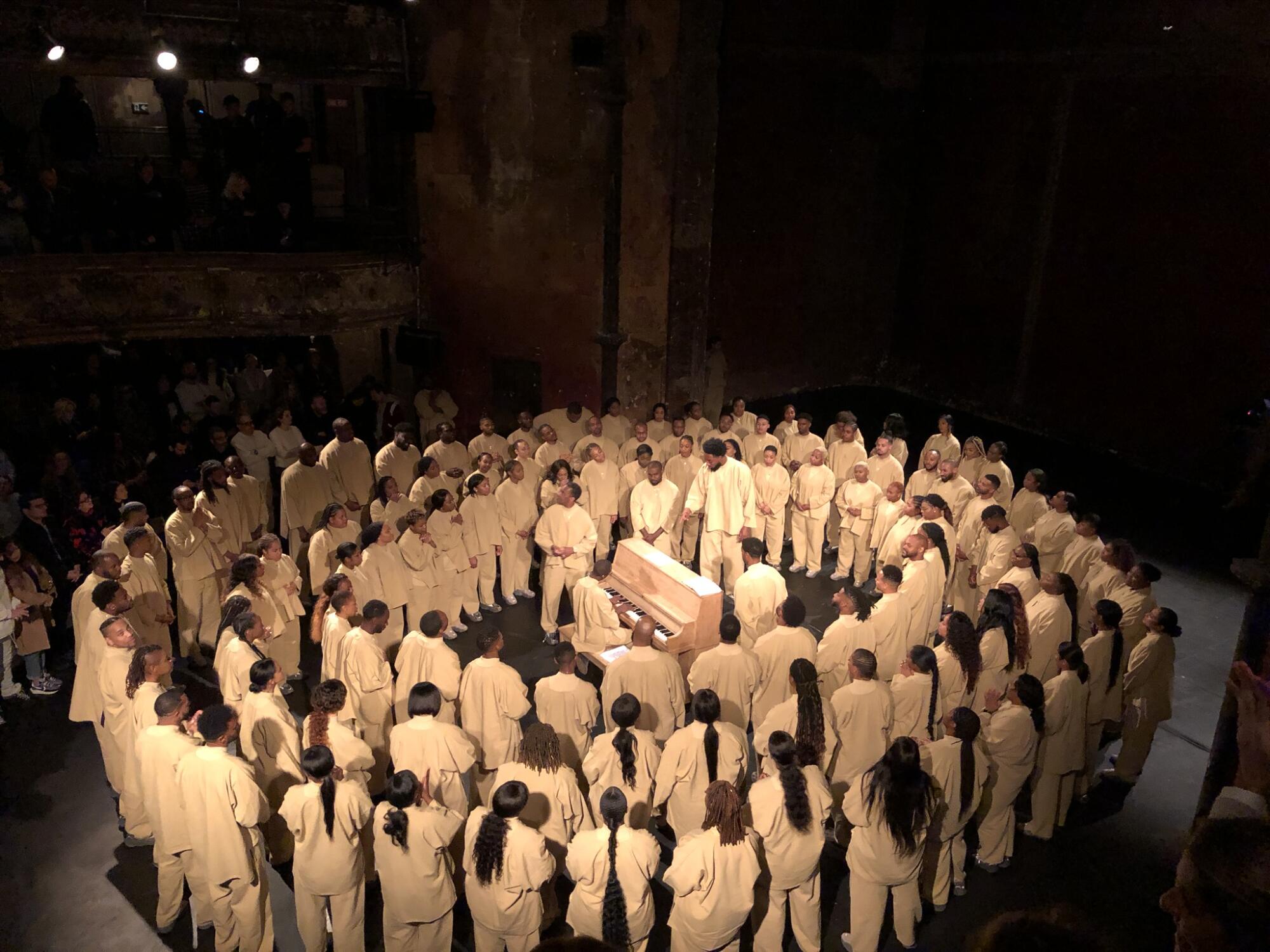People wearing white clothing stand in a circular formation