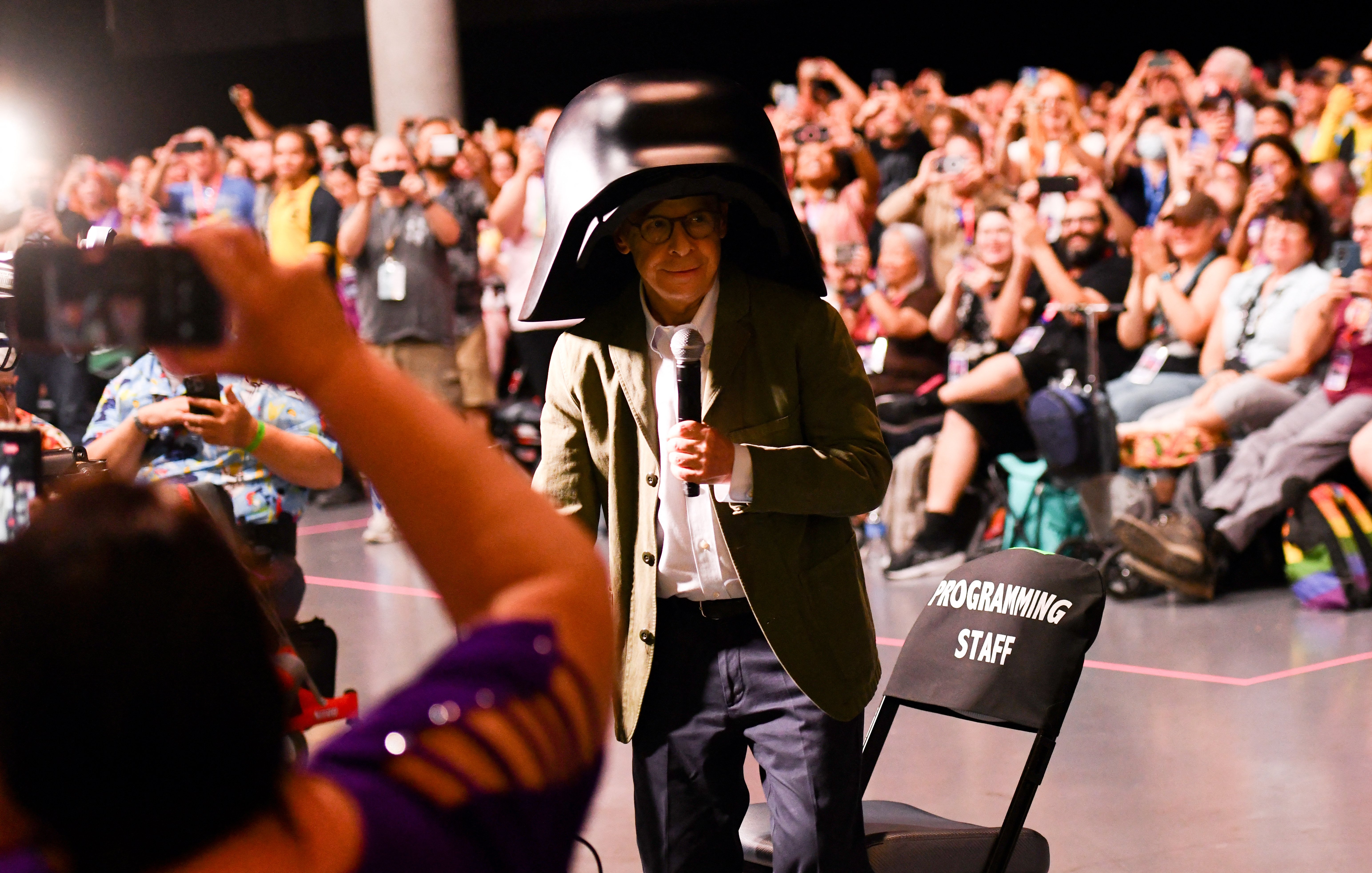 Actor Rick Moranis wears his Lord Dark Helmet costume as he attends "Spaceballs: The New One" panel during Comic Con International in San Diego, on July 24, 2026. 