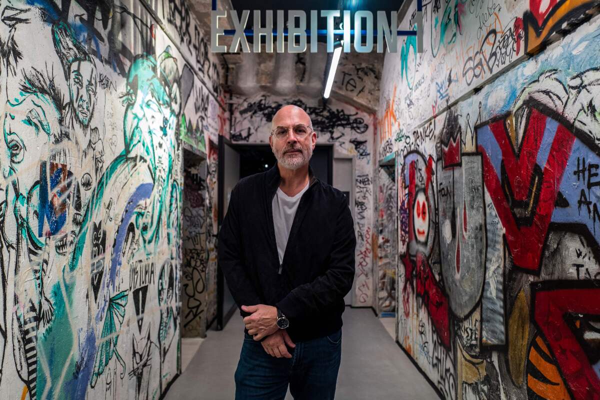Yoram Roth poses in a hallway of the new Fotografiska museum in Berlin in 2023.