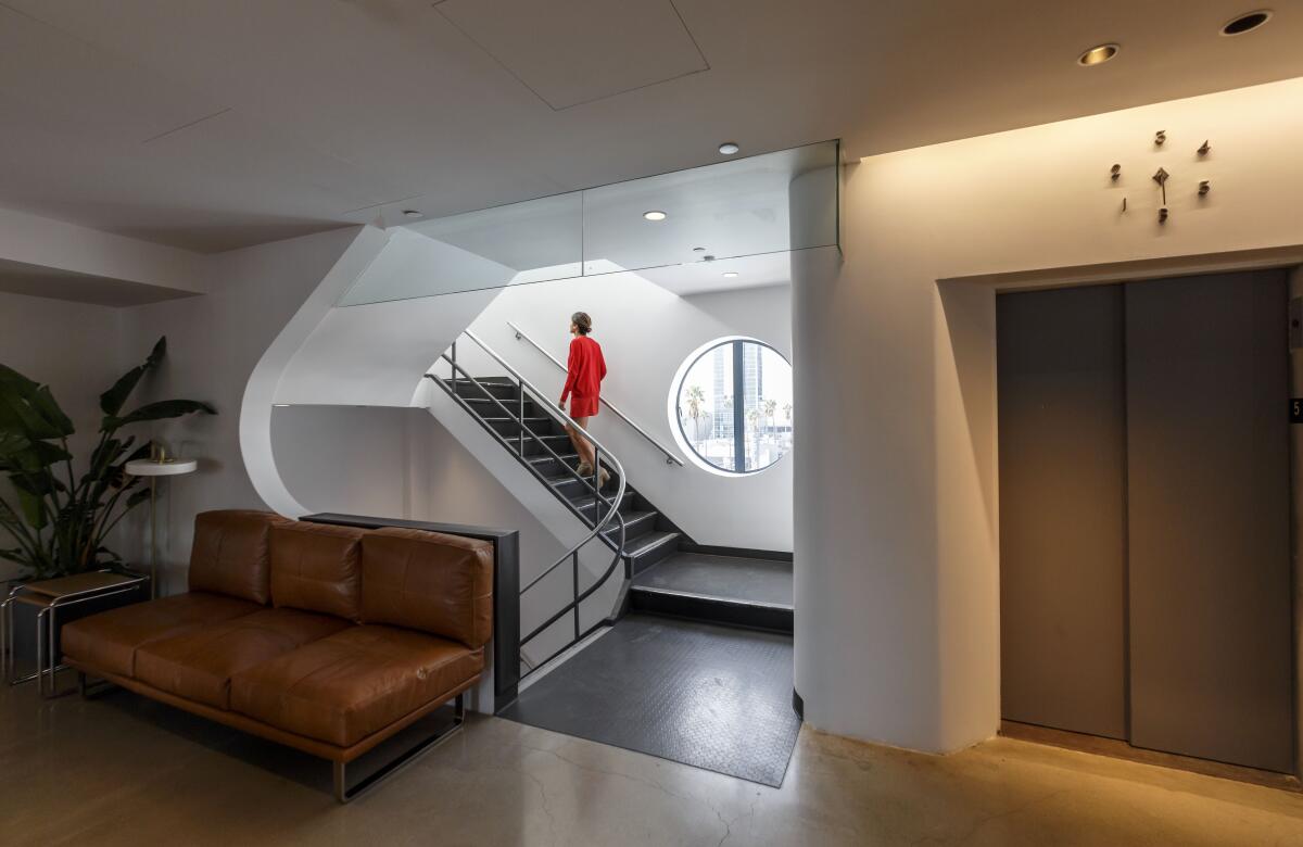  Third-floor stairwell and elevator at the NeueHouse.