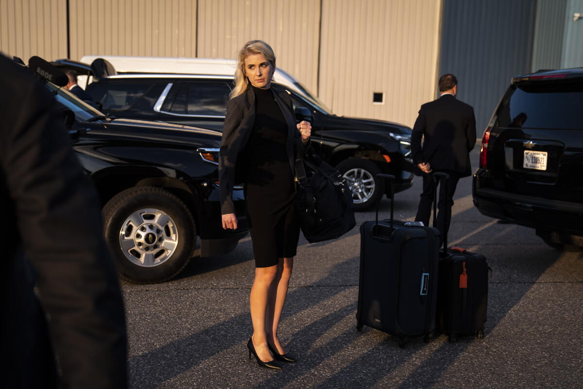 Natalie Harp follows former President Trump as he boards his airplane in 2023