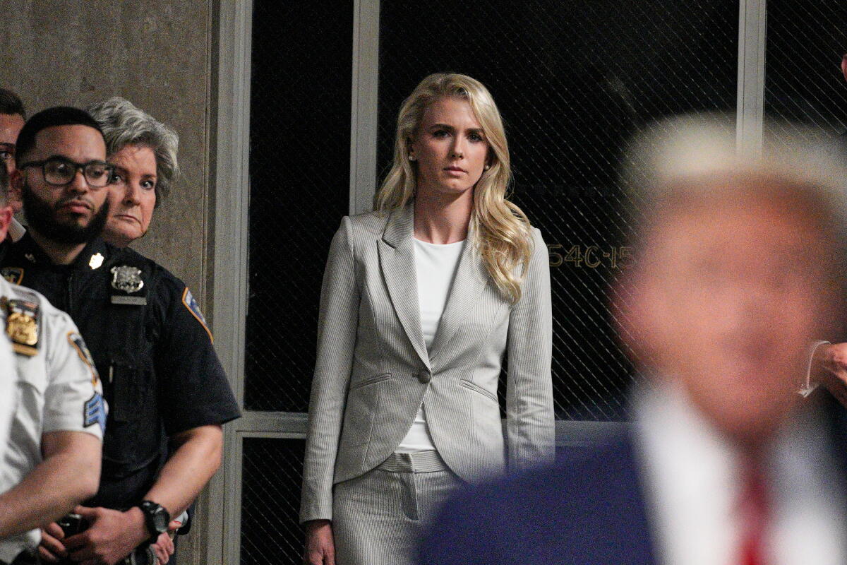 Natalie Harp listens as former President Trump speaks in 2024.