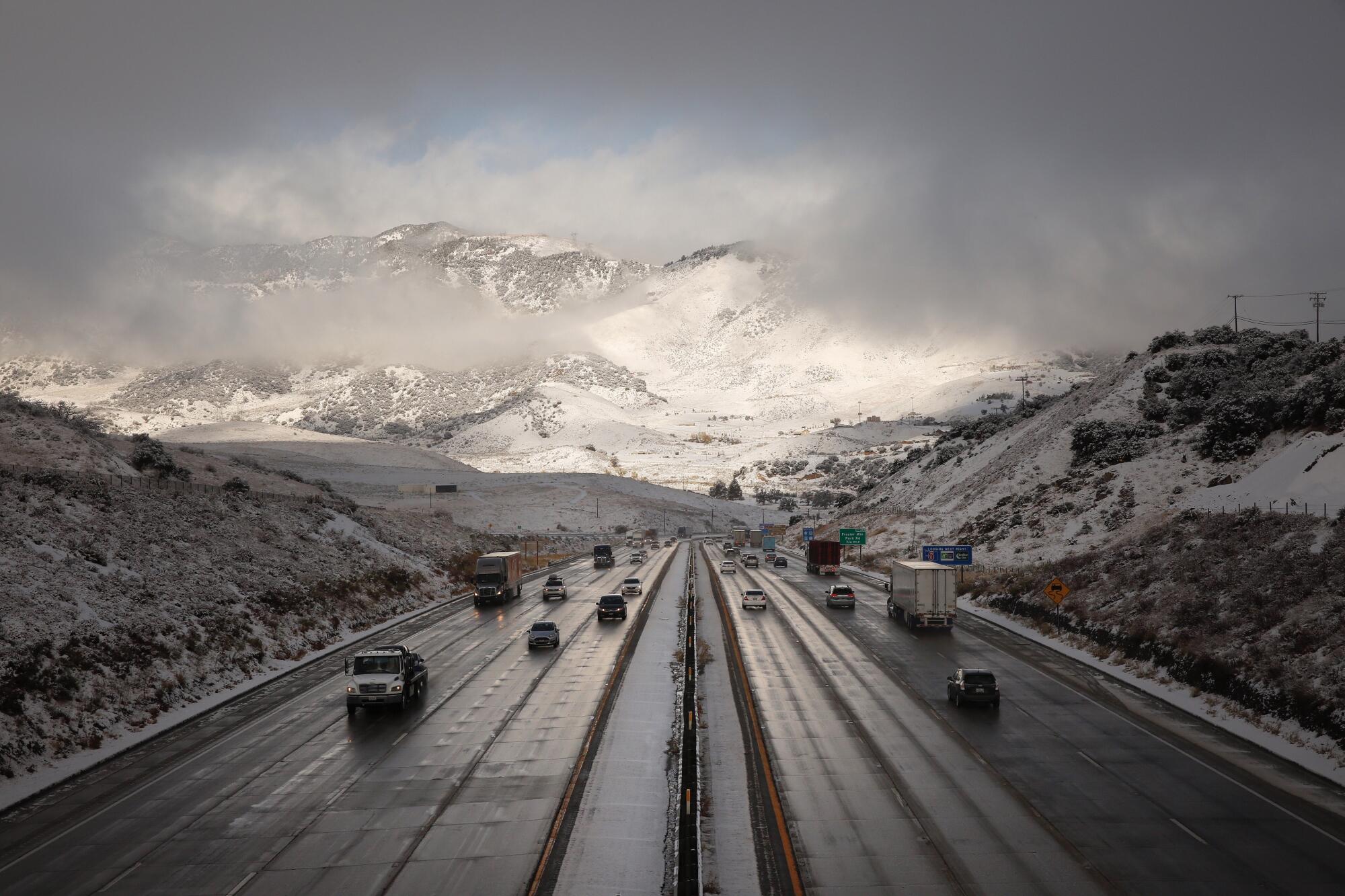 Snow blankets the top of the Tejon Pass on the I-5 at 4,160 feet between Gorman and Frazier Park on Nov. 27, 2019.