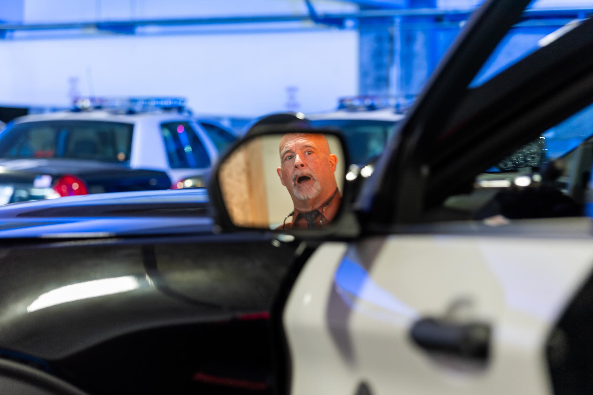 Greg Field, director of police transportation, Motor Transport Division, shows off the Federal Signal Rumbler.