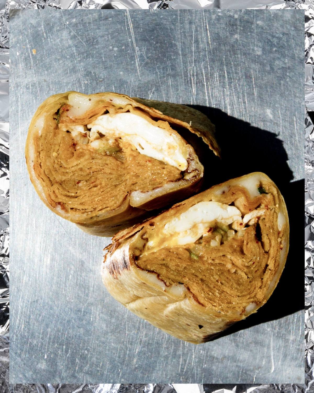 The breakfast burrito by Evil Cooks's Elvia "La Bruja" Huerta and Alex "Pobre Diablo" Garcia 