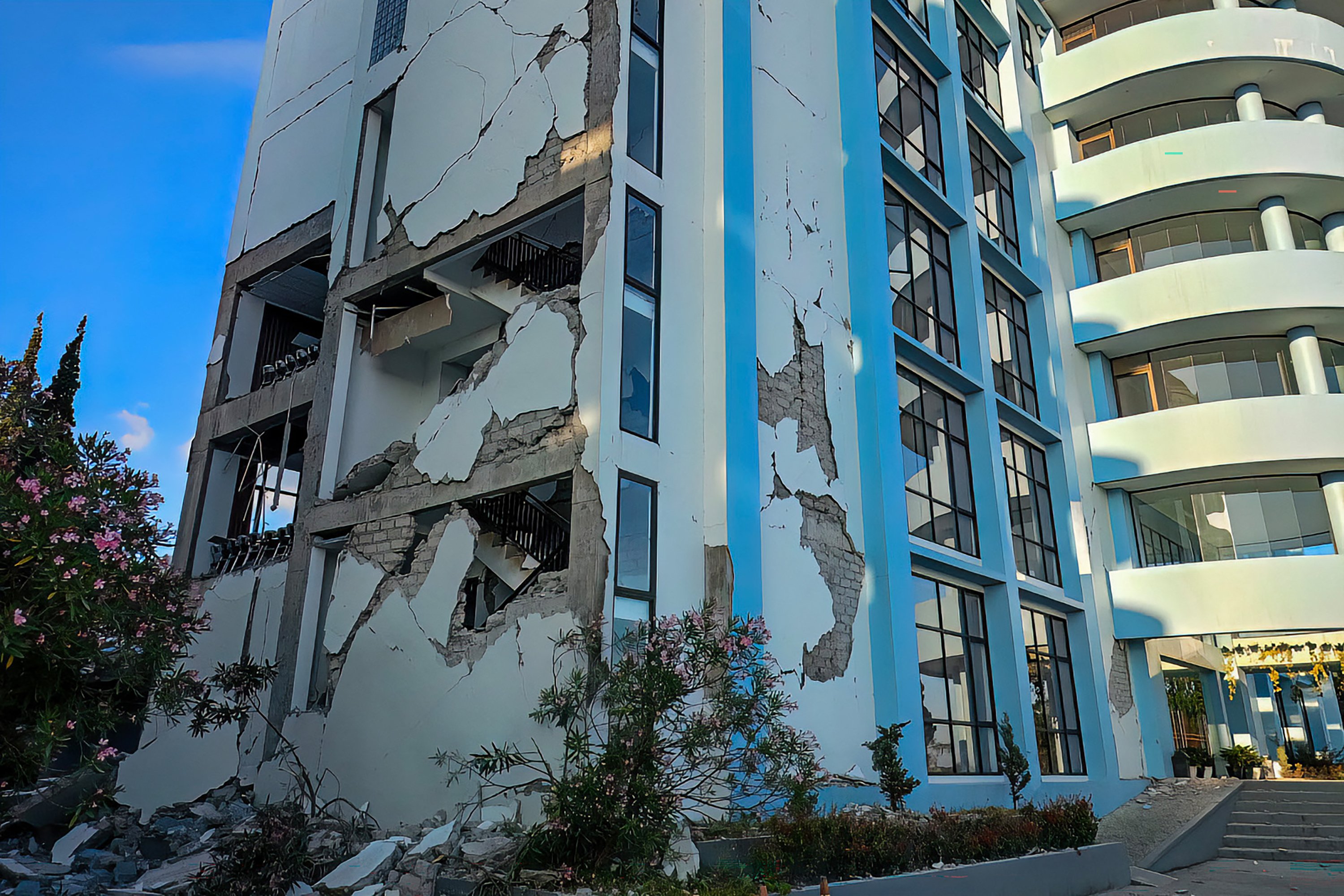 A damaged building is seen following a 7.7-magnitude earthquake in Ruteng, Manggarai, East Nusa Tenggara, on Saturday.