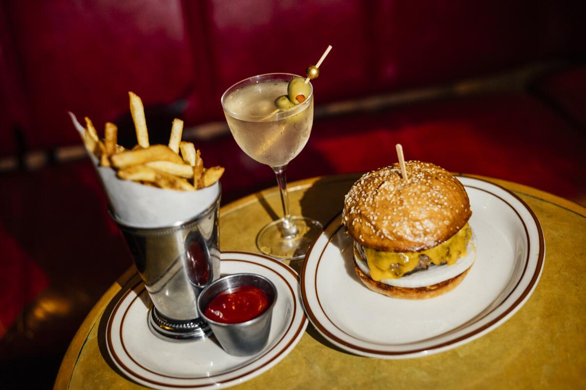 The Franklin Burger at Franklin Lounge with fries and a martini. 