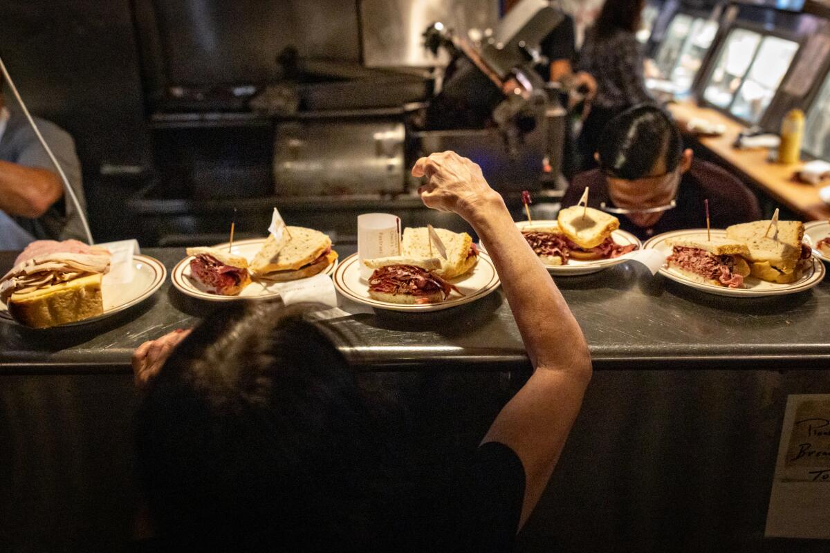 Pastrami sandwiches set on the line at Canter's Deli