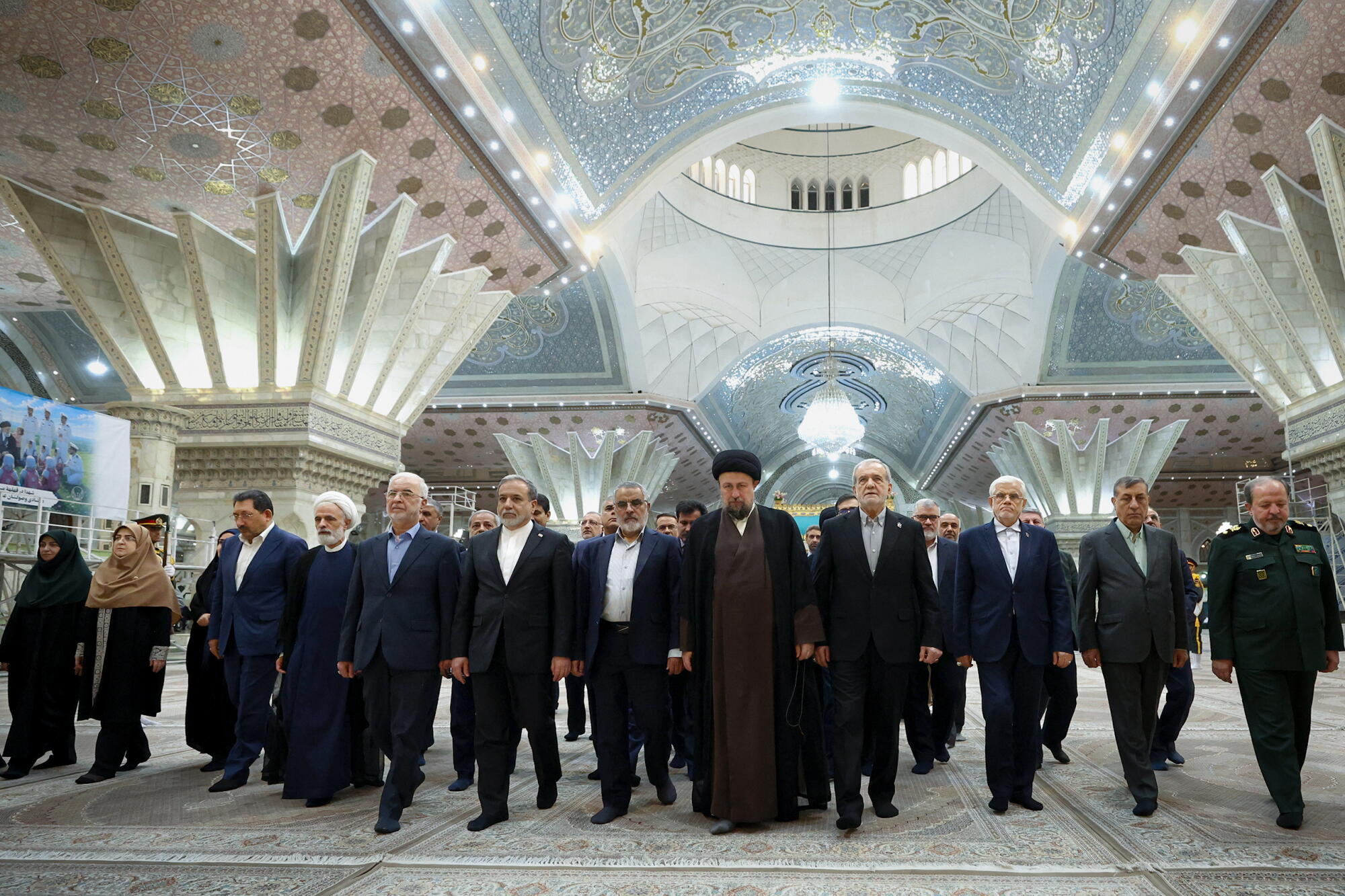 Iranian officials attend an event at the ayatollah's mausoleum to mark the first day of 'Government Week' 