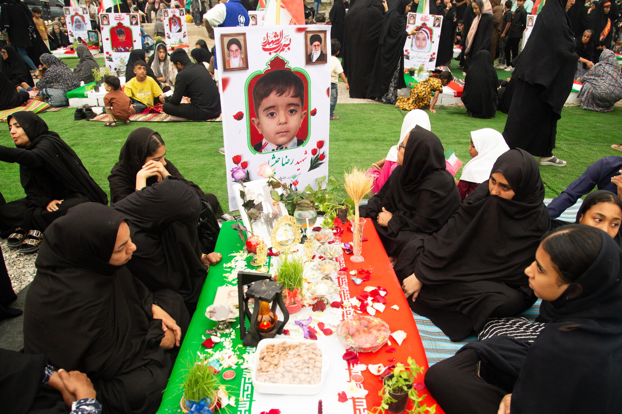 The family of 8-year-old Reza Habashian, a second-grader, observes the Persian New Year at his graveside