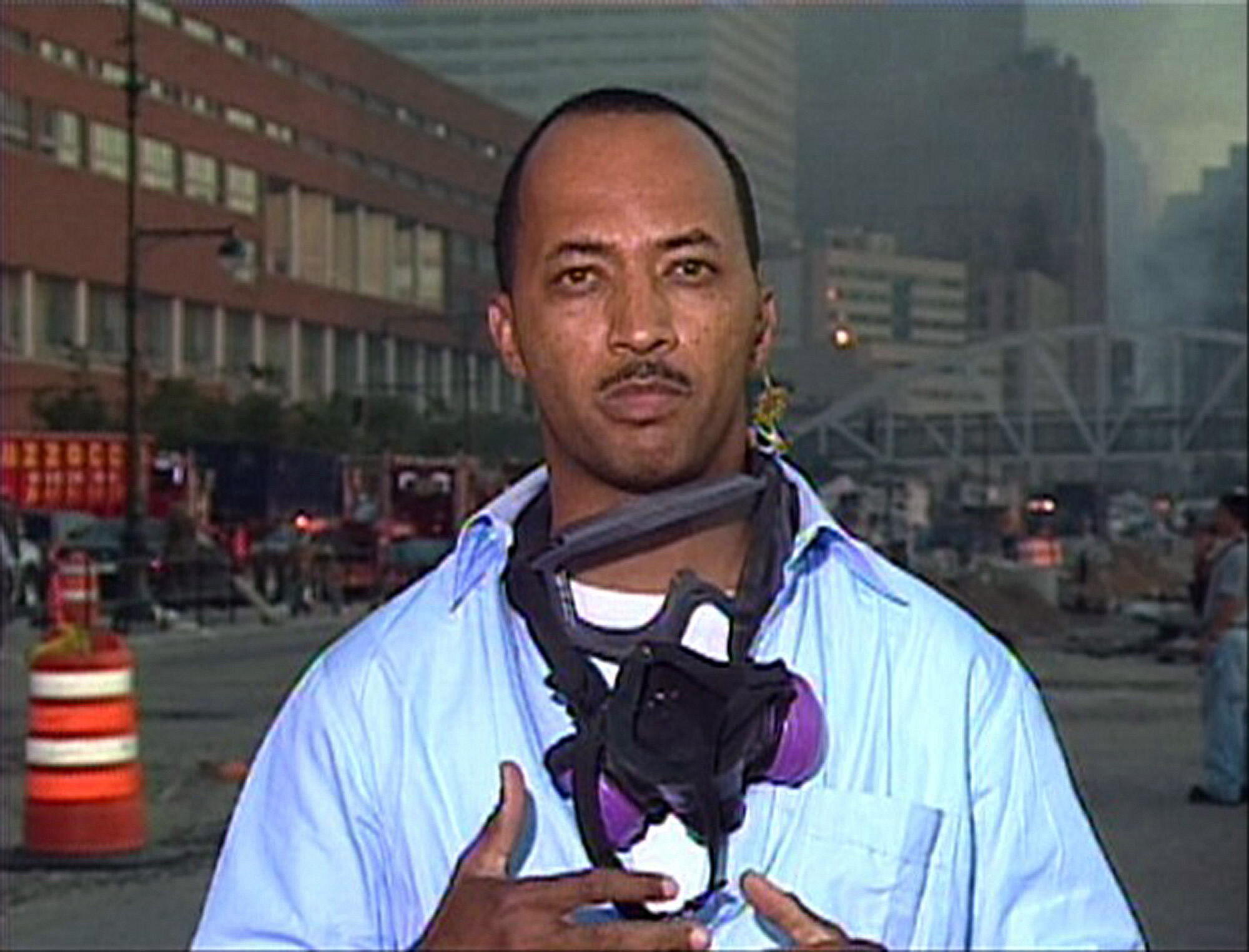Byron Pitts covering the terrorist attacks in lower Manhattan for CBS News on Sept. 11, 2001.