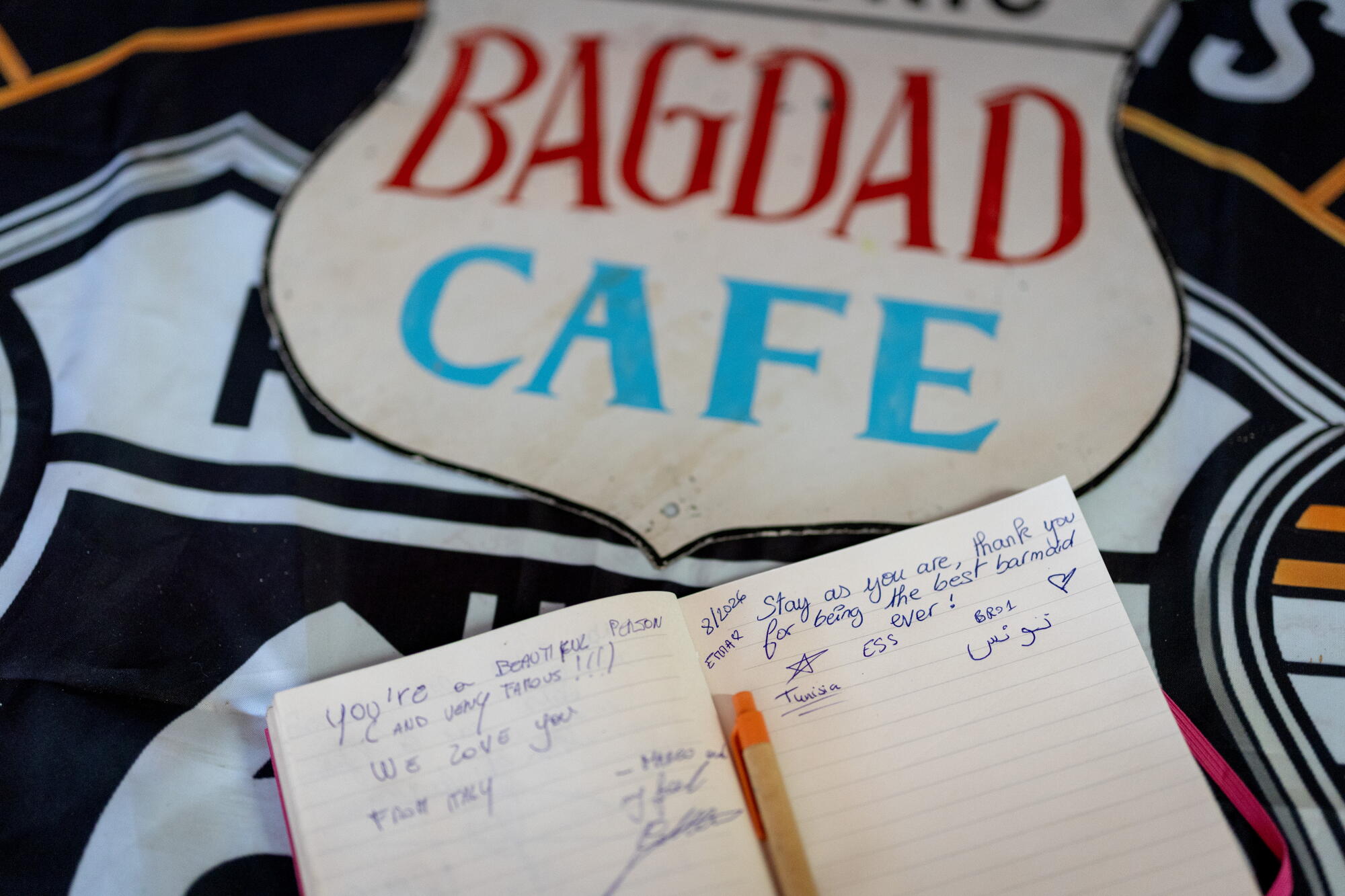 A guest book displays messages at the Bagdad Cafe.