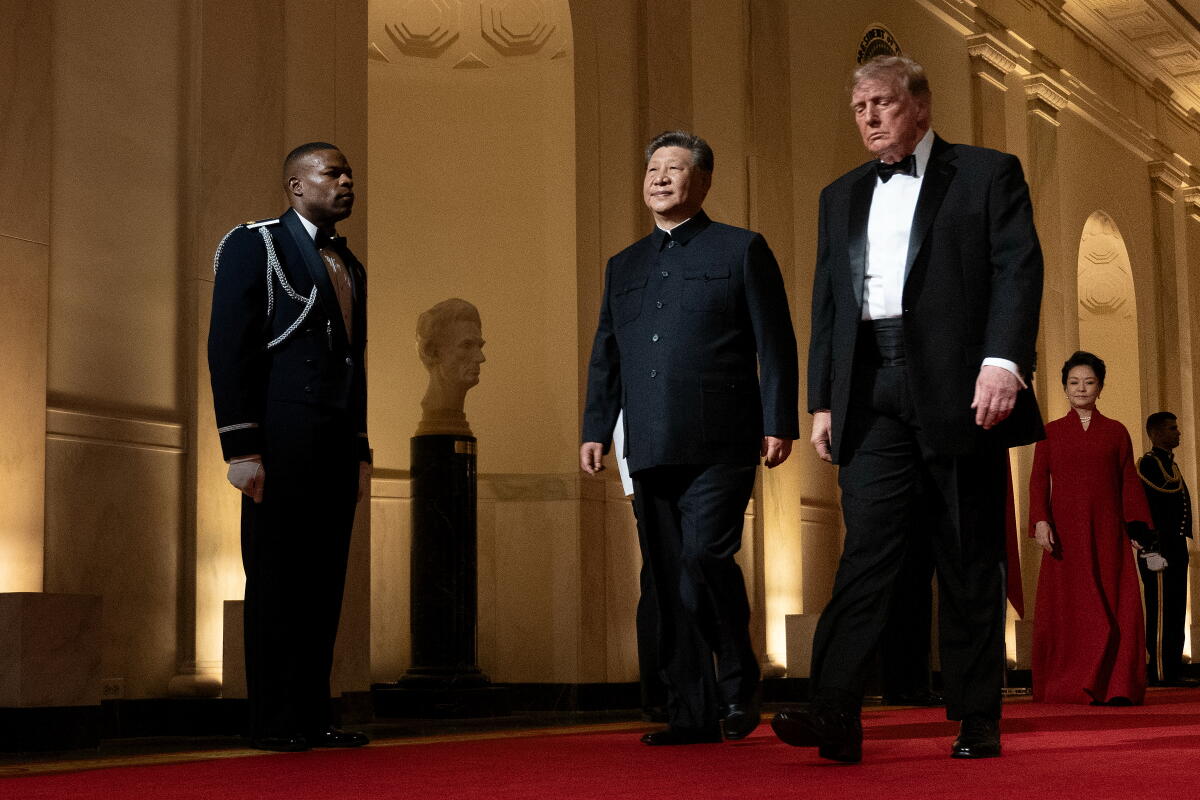 Presidents Donald Trump and Xi Jinping arrive for Thursday's state dinner.