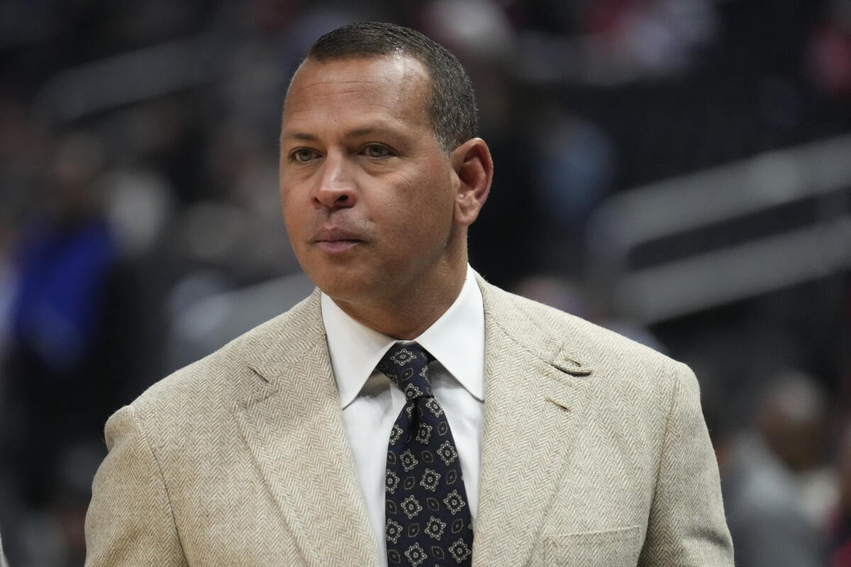 Former Major League Baseball player Alex Rodriguez attends an NBA basketball game 