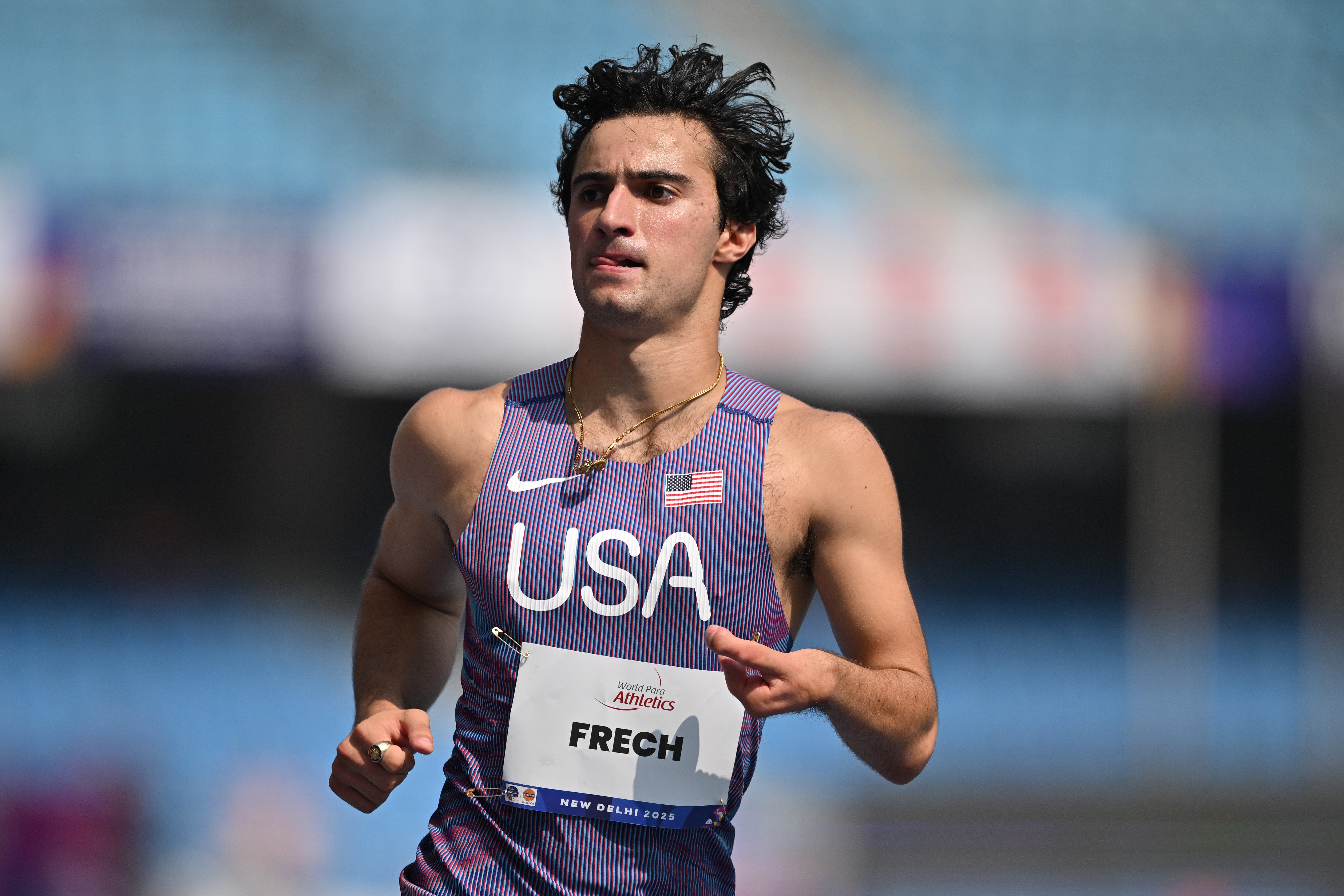 NEW DELHI, INDIA - OCTOBER 05: Ezra Frech of Team United States competes in the Men’s 100m - T63 Heats during day nine of the World Para Athletics Championships New Delhi 2025 at Jawaharlal Nehru Stadium on October 05, 2025 in New Delhi, India. (Photo by Kenta Harada/Getty Images)