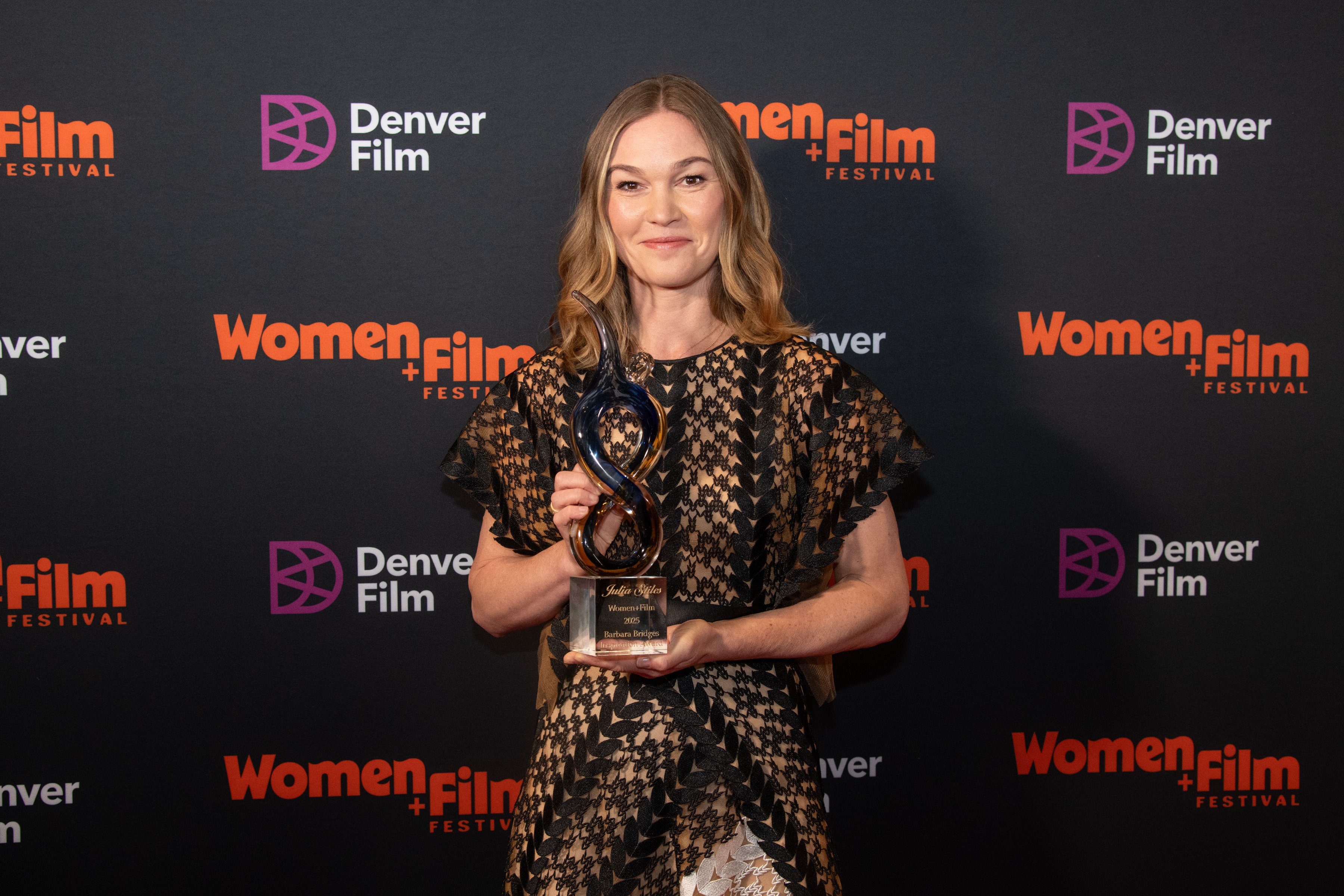 DENVER, COLORADO - MAY 30: Julia Stiles, the honoree of the Women + Film Barbara Bridges Inspiration Award, attends Denver Film's Women + Film Festival at Denver Botanic Gardens on May 30, 2025 in Denver, Colorado. (Photo by Thomas Cooper/Getty Images)