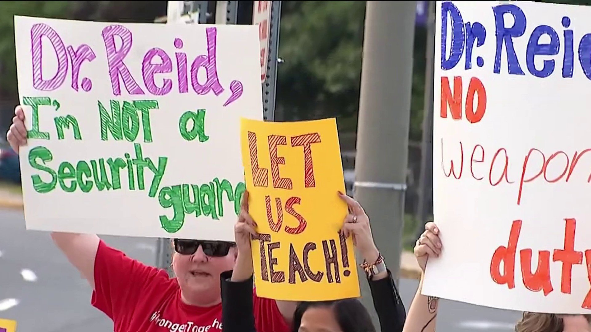 Fairfax County teachers protest after being required to do weapons detection