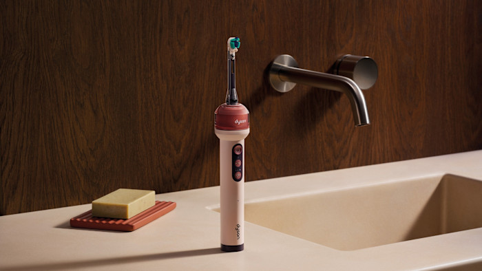Dyson CameraJet toothbrush next to a sink