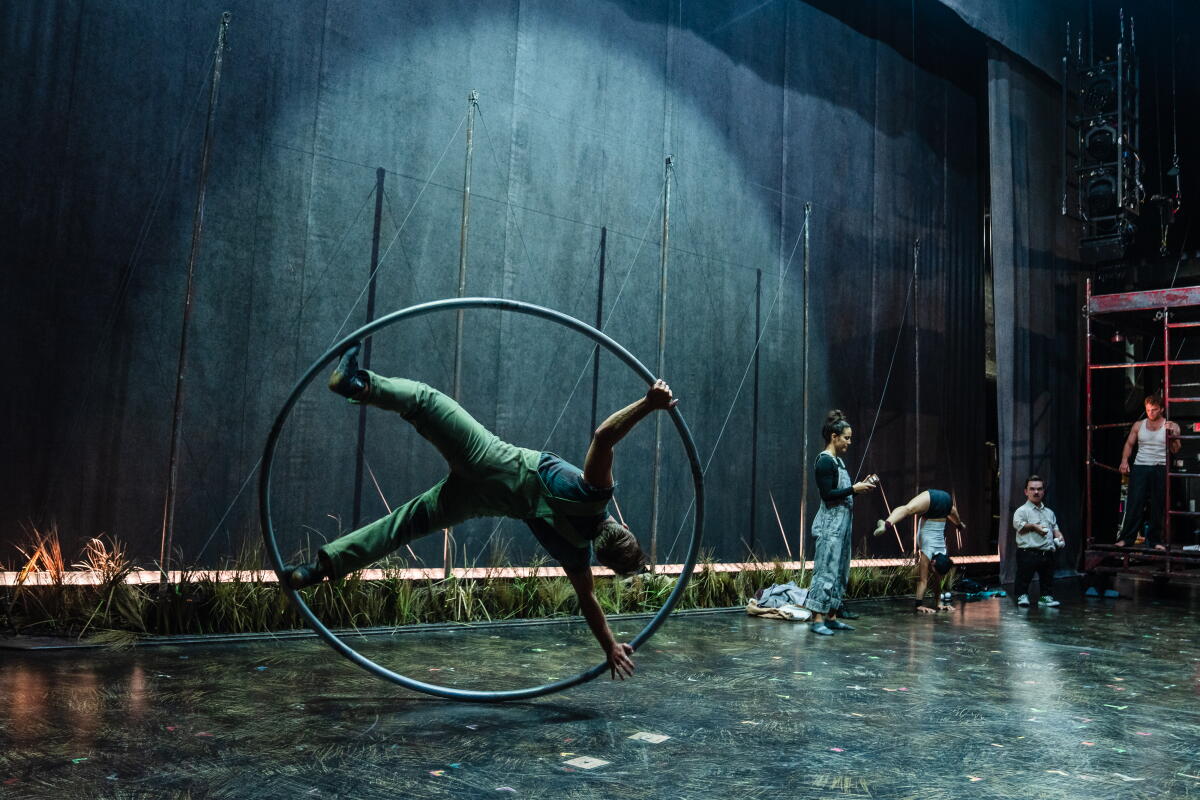 Adam Fullick of Broadway's "Water for Elephants" practicing using a Cyr wheel on stage 