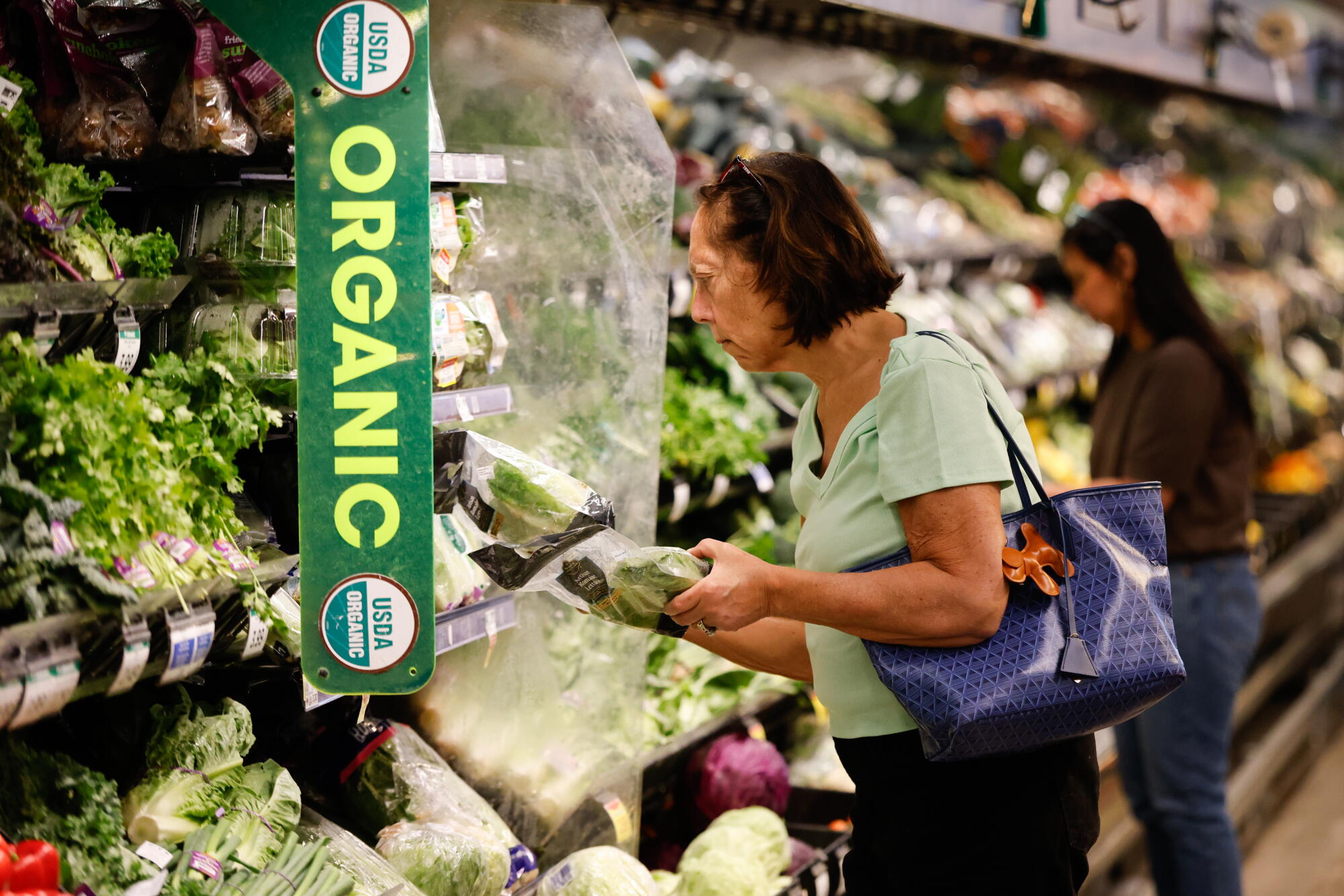  Jessica Ross in the produce area at Ralphs