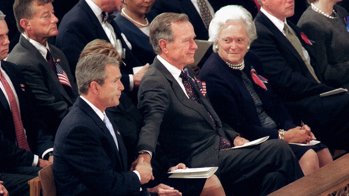 (1st row L-R) President George W. & Laura Bush, Former President George H.W.Bush, Barbara Bush, Former President Bill Clinton, Sen. Hillary Rodham Clinton & Chelsea Clinton attend a National Day of Prayer Service at the National Cathedral after the 9/11 terrorist attacks on the World Trade Center & the Pentagon. In the third row are Al & Tipper Gore. (Photo by Brooks Kraft LLC/Corbis via Getty Images)