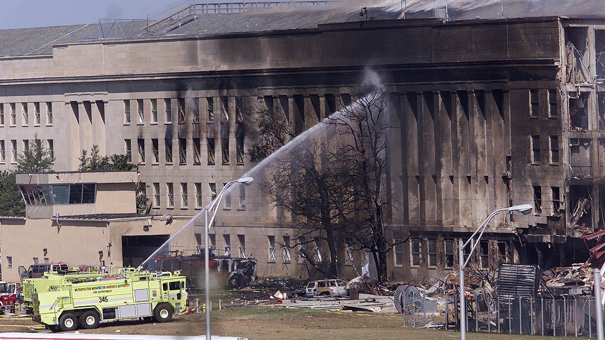 An MWAA fire truck fights a fire at the Pentagon after Flight 77 from Dulles was hijacked and intentionally crashed into it on Sept. 11, 2001. 