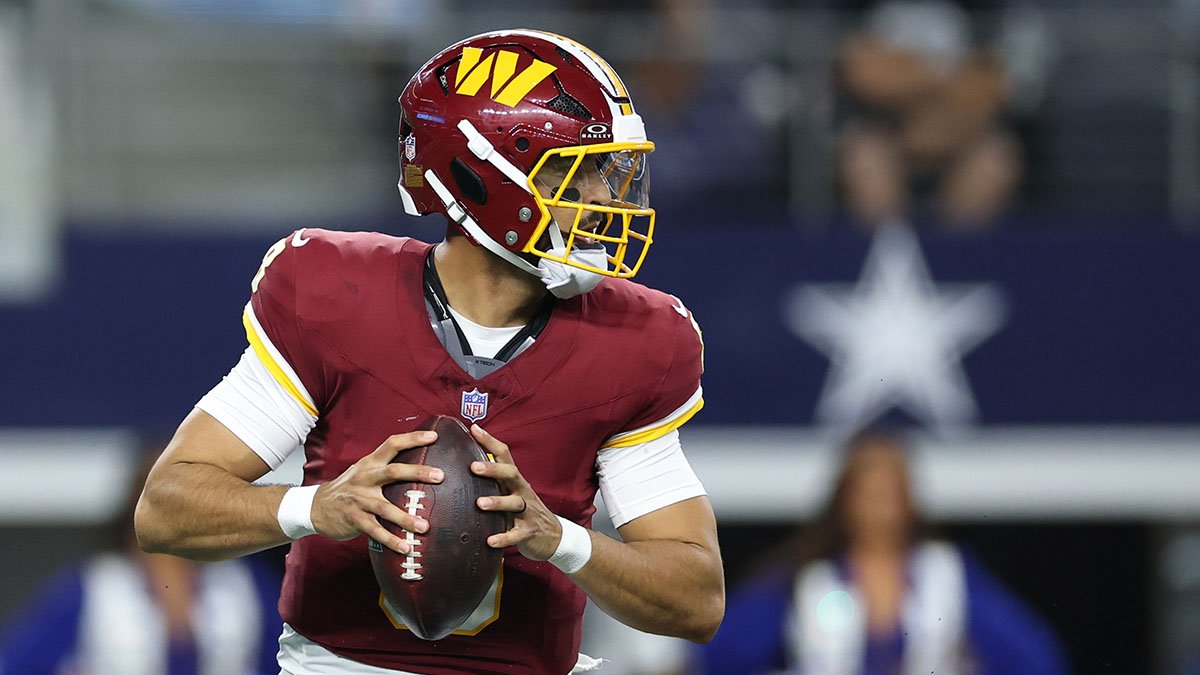 ARLINGTON, TEXAS - SEPTEMBER 20: Marcus Mariota #8 of the Washington Commanders looks to pass against the Dallas Cowboys in the third quarter of a game at AT&T Stadium on September 20, 2026 in Arlington, Texas. (Photo by Stacy Revere/Getty Images)