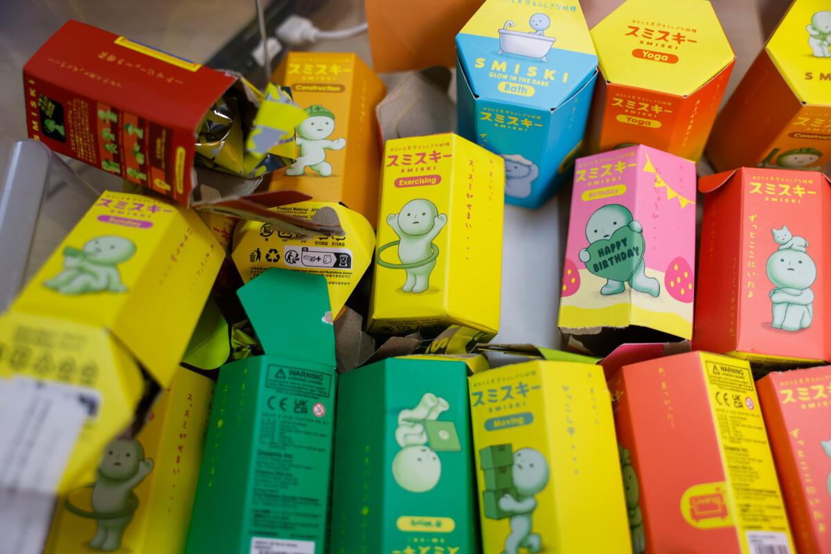 Various Smiski boxes lie in a box for clients at JapanLA.