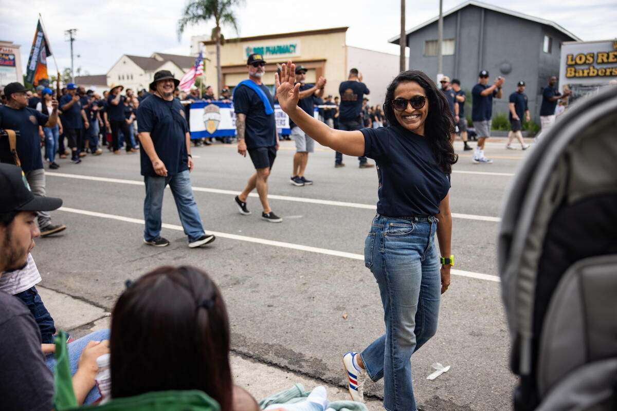 L.A. mayoral candidate Nithya Raman greeting parade watchers