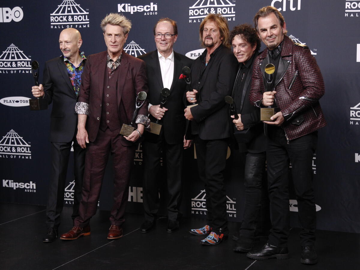 This file photo shows members of the band Journey.